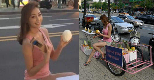 首爾大街上出現《水果女》 坐在推車上雕刻水果藝術  首爾大街上出現《水果女》 坐在推車上雕刻水果藝術