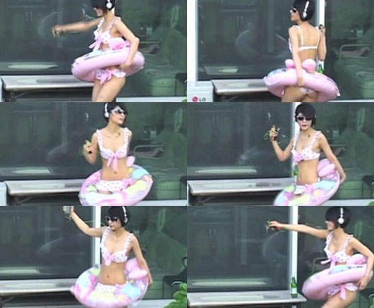 南韓  屋頂比基尼妹 套泳圈聽歌跳舞 南韓  屋頂比基尼妹 套泳圈聽歌跳舞
